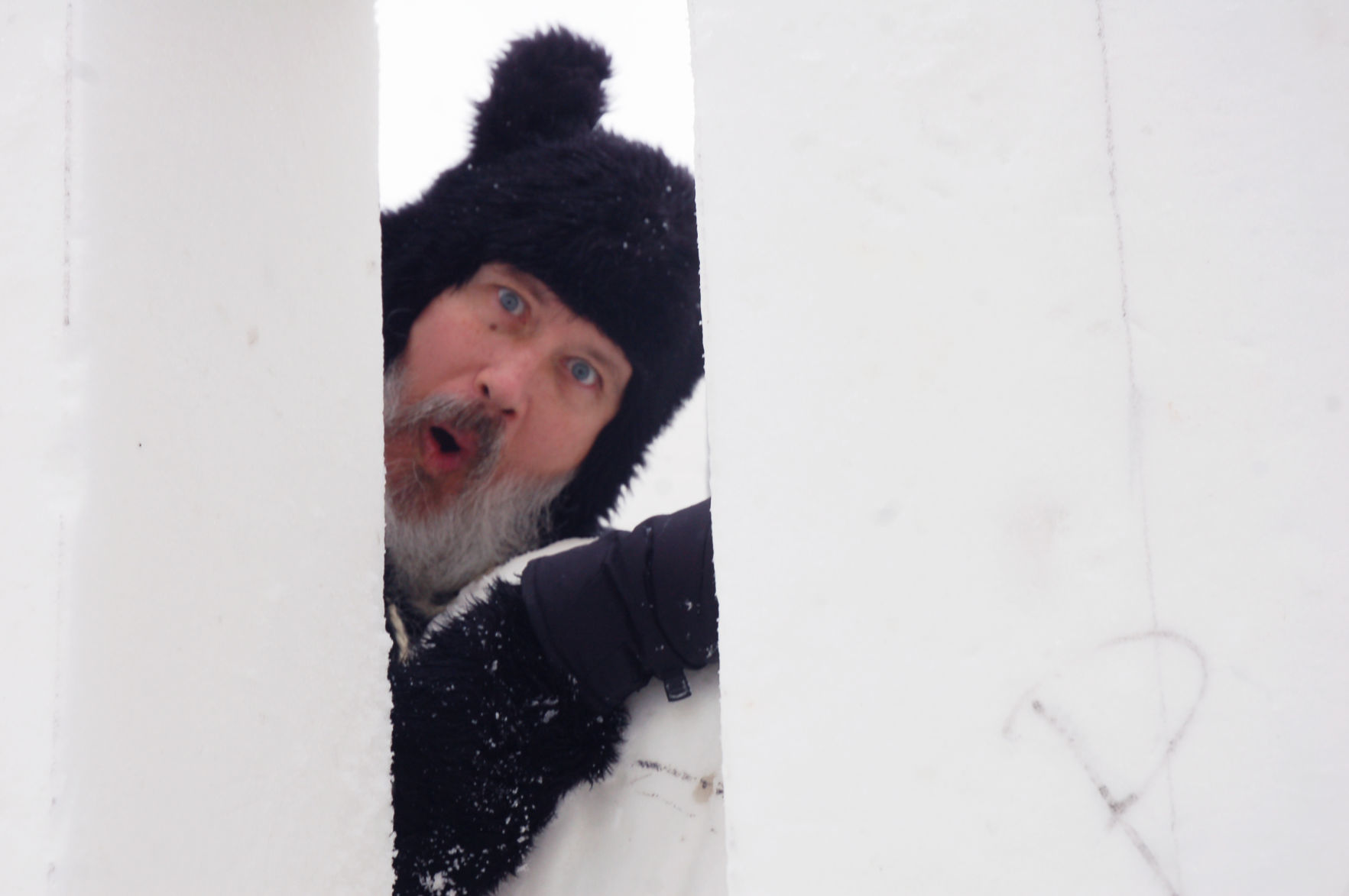 Snow sculptor 'Man Bear' looks out at crowd